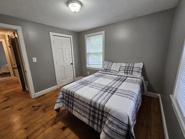 436 Mammoth Rd, Pelham, NH 03076 - bedroom featuring hardwood / wood-style floors and baseboards