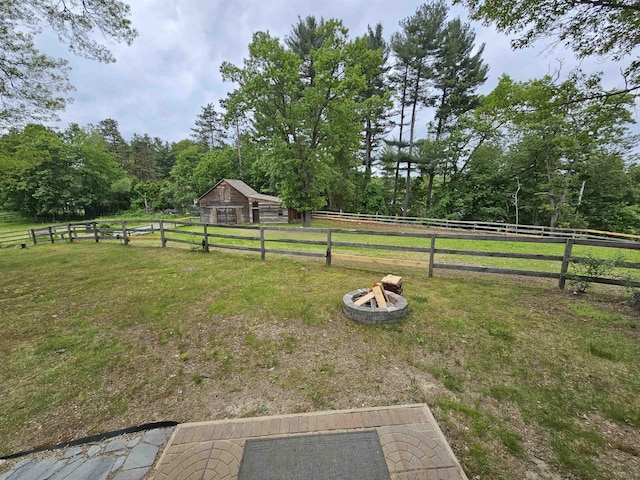 436 Mammoth Rd, Pelham, NH 03076 - view of yard featuring an outdoor fire pit and a barn