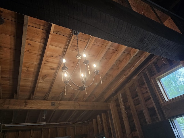 436 Mammoth Rd, Pelham, NH 03076 - detailed view of a chandelier and wooden ceiling