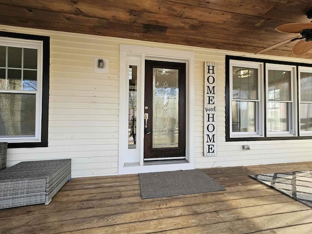 436 Mammoth Rd, Pelham, NH 03076 - doorway to property with a ceiling fan and covered porch