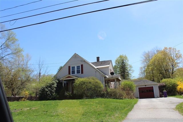 4 Maple Ave, Claremont, NH 03743 - view of front of property with driveway, a front lawn, and a chimney