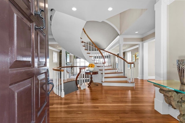 1097 Taber Ridge Rd, Stowe, VT 05672 - entryway featuring crown molding, wood finished floors, recessed lighting, stairway, and baseboards