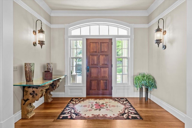 1097 Taber Ridge Rd, Stowe, VT 05672 - foyer entrance featuring wood finished floors, baseboards, and ornamental molding