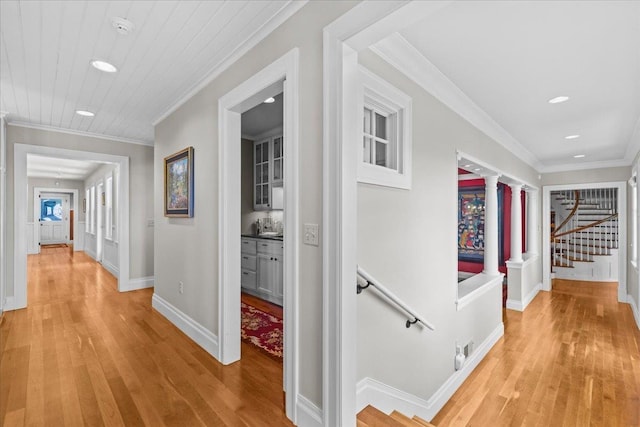 1097 Taber Ridge Rd, Stowe, VT 05672 - hallway featuring recessed lighting, light wood-type flooring, baseboards, crown molding, and stairway