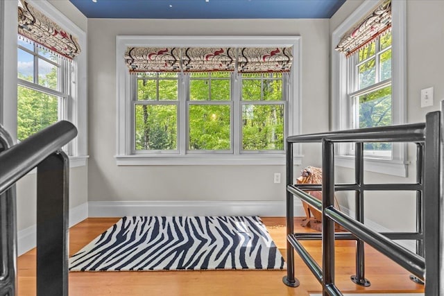 1097 Taber Ridge Rd, Stowe, VT 05672 - sitting room featuring healthy amount of natural light, wood finished floors, and baseboards