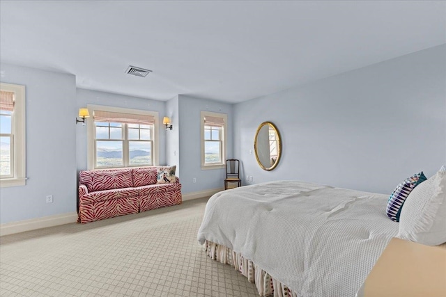 1097 Taber Ridge Rd, Stowe, VT 05672 - bedroom featuring baseboards, multiple windows, and carpet