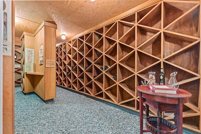 1097 Taber Ridge Rd, Stowe, VT 05672 - wine area featuring carpet flooring and a textured ceiling
