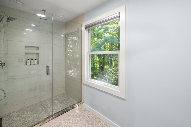 47 Hollow View Rd, Stowe, VT 05672 - full bathroom with a stall shower, baseboards, and tile patterned floors
