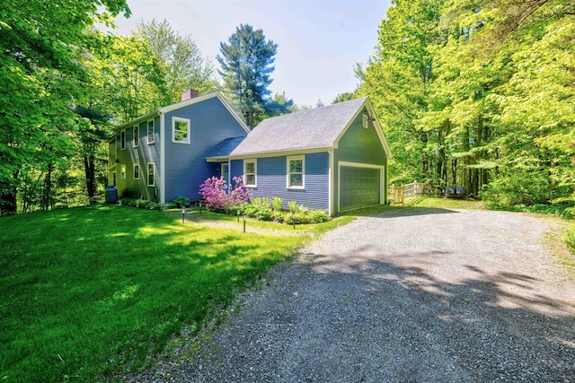 47 Hollow View Rd, Stowe, VT 05672 - colonial house featuring a chimney and gravel driveway