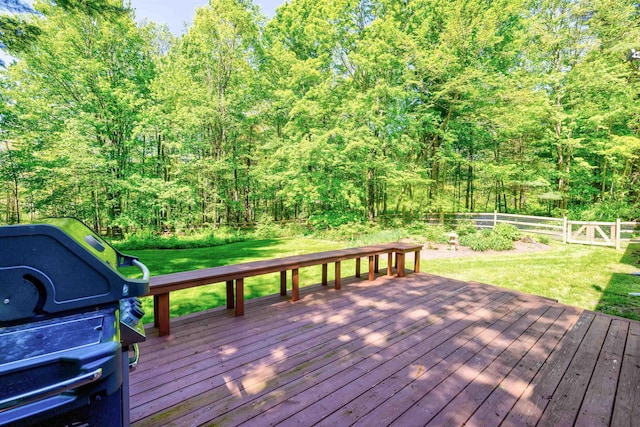47 Hollow View Rd, Stowe, VT 05672 - deck featuring area for grilling and a forest view