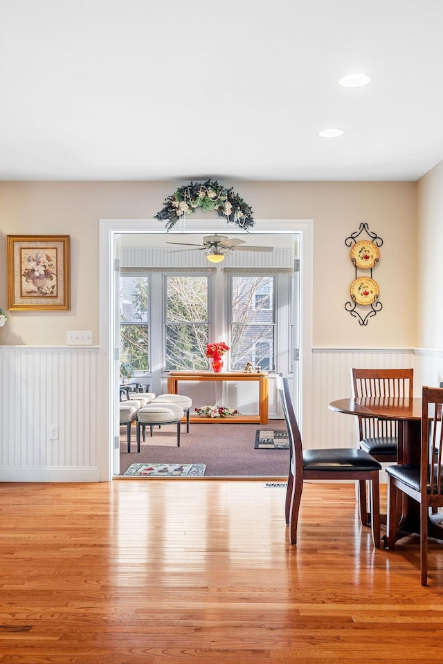 7 Elystan Cir, Nashua, NH 03064 - dining room featuring wood finished floors, wainscoting, and recessed lighting