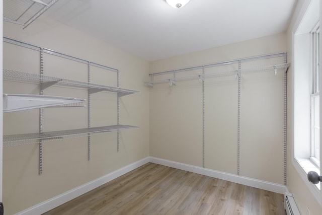 38 Howard Hill Rd, Jaffrey, NH 03452 - spacious closet featuring a baseboard radiator and light wood-type flooring