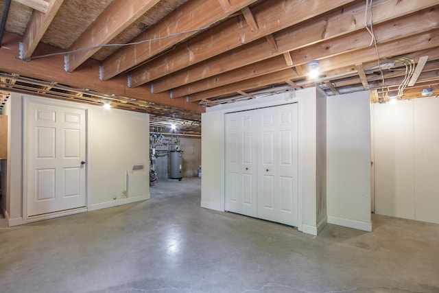 38 Howard Hill Rd, Jaffrey, NH 03452 - unfinished basement featuring gas water heater and baseboards