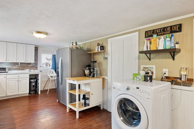 194 Pleasant St, Bristol, NH 03222 - laundry area featuring washer / clothes dryer, dark wood finished floors, and ornamental molding