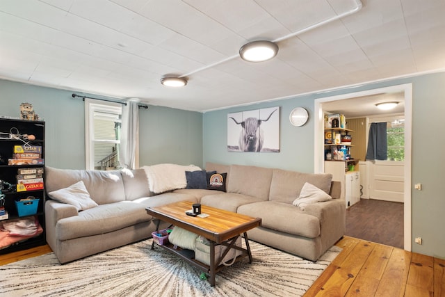 194 Pleasant St, Bristol, NH 03222 - living area with wood finished floors and ornamental molding