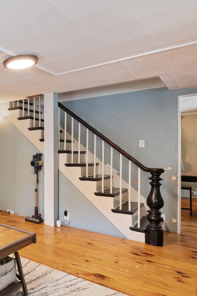 194 Pleasant St, Bristol, NH 03222 - stairway with wood finished floors