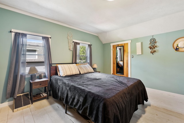 194 Pleasant St, Bristol, NH 03222 - bedroom featuring lofted ceiling and ornamental molding