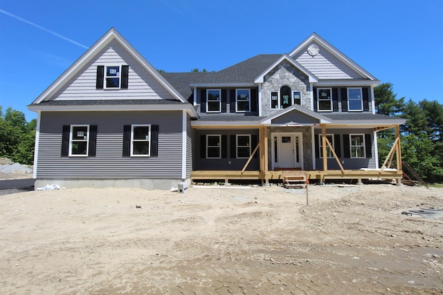 21 Cornstalk Ln, Pelham, NH 03076 - view of front facade with stone siding and covered porch