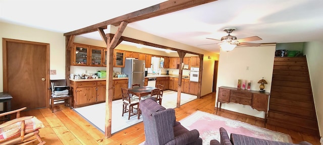 21 Triton Dr, Rye, NH 03870 - dining space featuring light wood finished floors and a ceiling fan