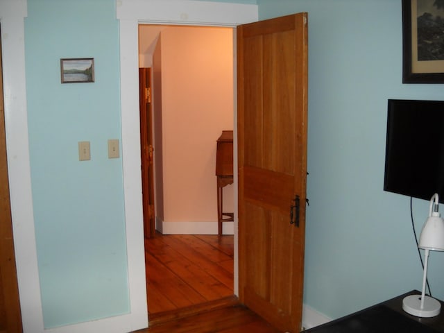 6 On The Cmn Unit 5, Lyme, NH 03768 - bedroom featuring wood-type flooring and baseboards