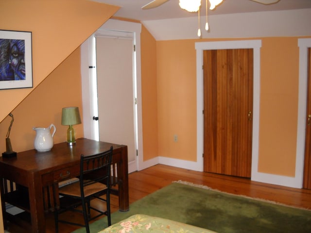 6 On The Cmn Unit 5, Lyme, NH 03768 - bedroom featuring wood finished floors and vaulted ceiling