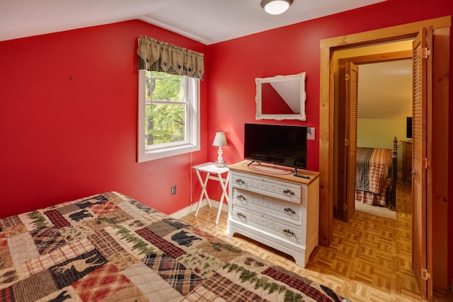 3233 Stinson Lake Rd, Ellsworth, NH 03266 - bedroom with lofted ceiling and baseboards