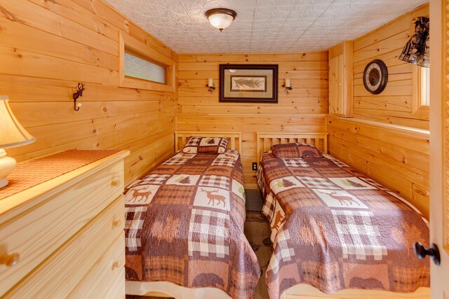 3233 Stinson Lake Rd, Ellsworth, NH 03266 - bedroom with an ornate ceiling and wooden walls