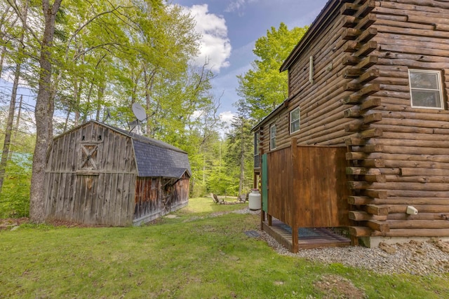 3233 Stinson Lake Rd, Ellsworth, NH 03266 - view of grassy yard featuring an outdoor structure