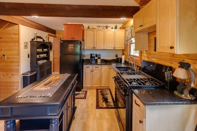 3233 Stinson Lake Rd, Ellsworth, NH 03266 - kitchen with black appliances, a sink, light wood-style floors, beamed ceiling, and light brown cabinets