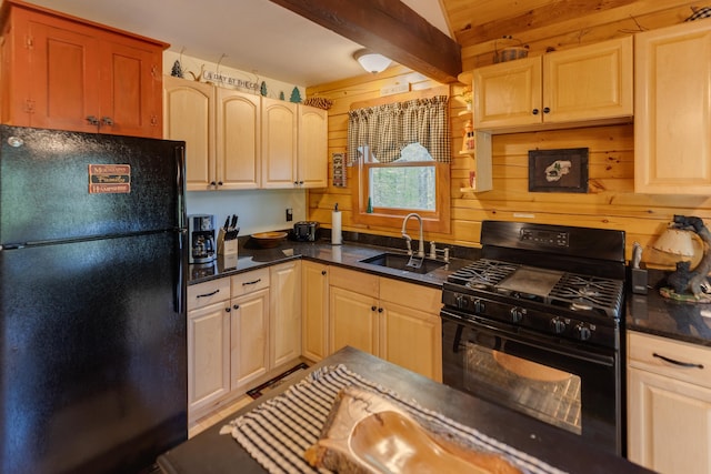 3233 Stinson Lake Rd, Ellsworth, NH 03266 - kitchen with black appliances, a sink, and dark stone counters