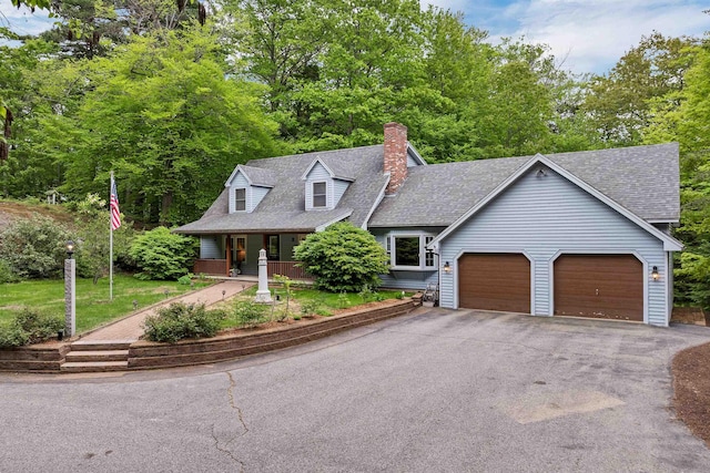 210 Province Rd, Belmont, NH 03220 - view of front of property featuring driveway, a garage, covered porch, a chimney, and a shingled roof