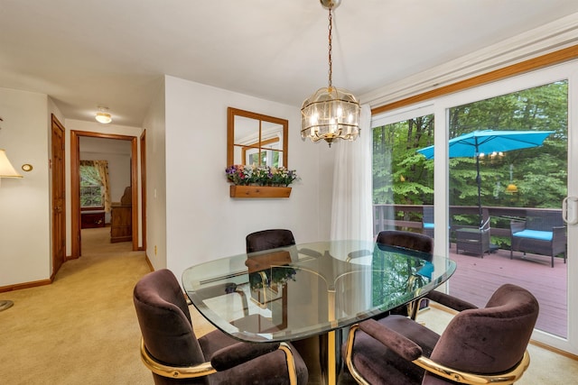 210 Province Rd, Belmont, NH 03220 - dining area featuring a chandelier, baseboards, and light colored carpet