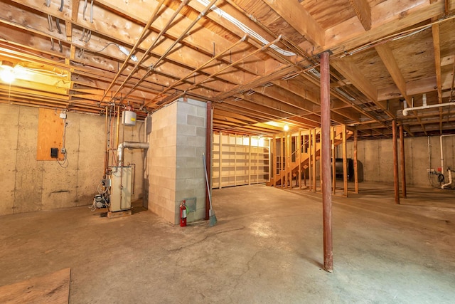210 Province Rd, Belmont, NH 03220 - unfinished basement featuring stairway and a heating unit