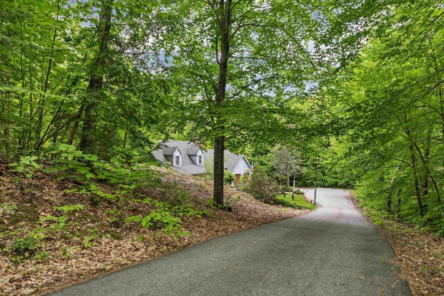 210 Province Rd, Belmont, NH 03220 - view of home's exterior with a wooded view