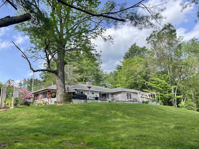 6 Nightingale Ln, Grantham, NH 03753 - rear view of house with a yard