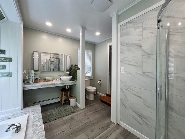 6 Nightingale Ln, Grantham, NH 03753 - bathroom featuring a stall shower, a baseboard radiator, wood finished floors, baseboards, and toilet