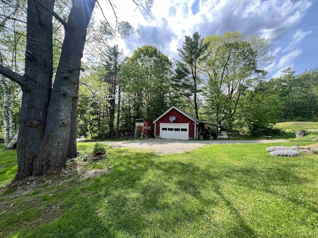6 Nightingale Ln, Grantham, NH 03753 - view of grassy yard featuring an outdoor structure and a detached garage