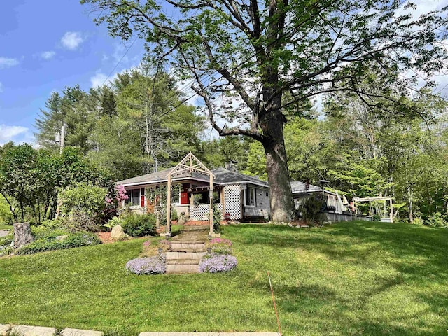 6 Nightingale Ln, Grantham, NH 03753 - view of front of house with a front lawn
