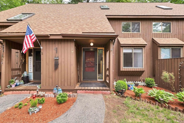 7 Victoria Dr, Merrimack, NH 03054 - view of exterior entry with a shingled roof