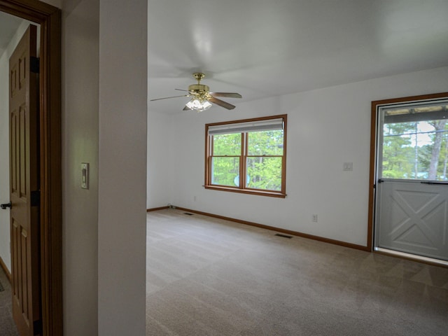 191 Rte 114, Sutton, NH 03221 - unfurnished room featuring carpet floors, healthy amount of natural light, ceiling fan, and baseboards