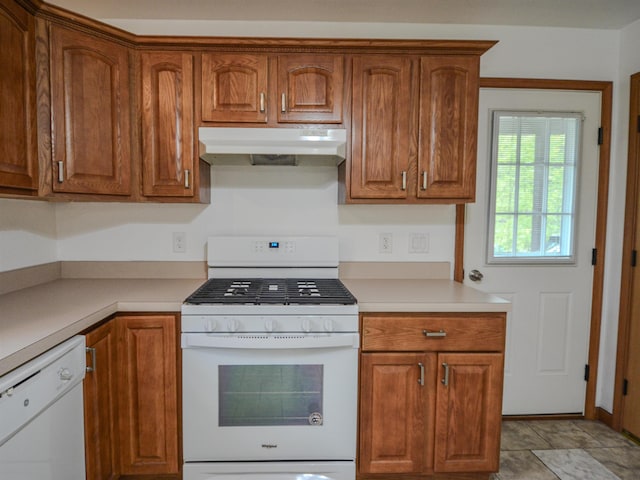 191 Rte 114, Sutton, NH 03221 - kitchen featuring under cabinet range hood, white appliances, and brown cabinets