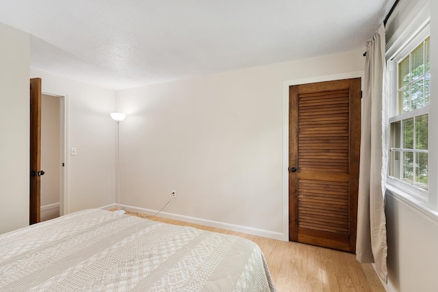 5 Christian Dr, Nashua, NH 03063 - bedroom featuring light wood-style flooring and baseboards