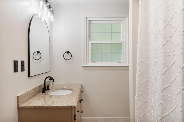 5 Christian Dr, Nashua, NH 03063 - full bath with vanity, baseboards, and curtained shower