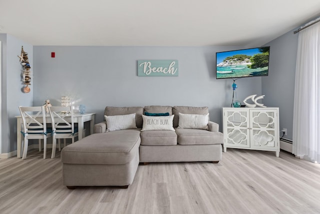 415 Ocean Blvd Unit 2B, Hampton, NH 03842 - living room featuring wood finished floors, baseboard heating, and baseboards