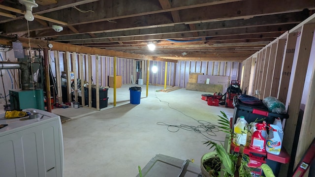 144 Bradford Rd, Henniker, NH 03242 - unfinished below grade area featuring washer / dryer