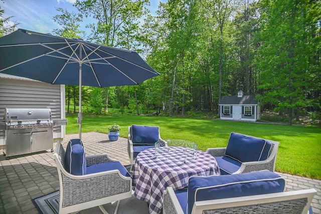 12 Haywick Dr, Stratham, NH 03870 - view of patio / terrace with area for grilling and an outbuilding