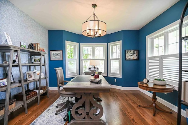 12 Haywick Dr, Stratham, NH 03870 - office area featuring a chandelier, baseboards, wood finished floors, and an accent wall