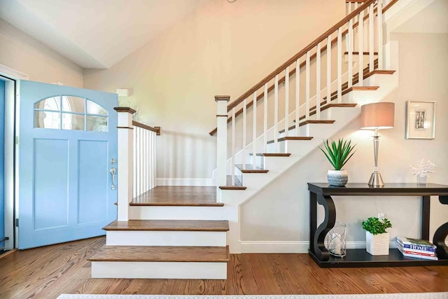 12 Haywick Dr, Stratham, NH 03870 - staircase featuring wood finished floors and baseboards