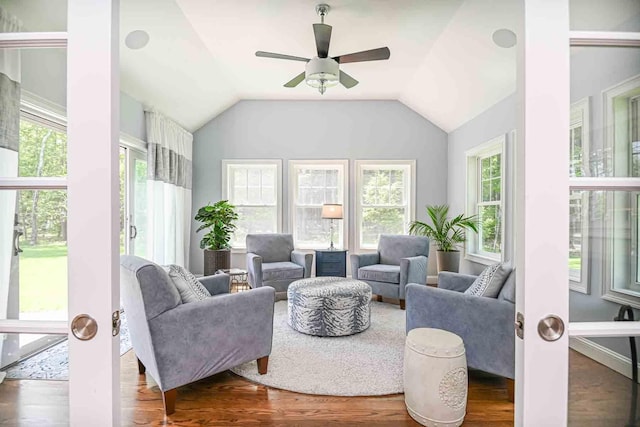 12 Haywick Dr, Stratham, NH 03870 - living area featuring wood finished floors, a ceiling fan, and vaulted ceiling