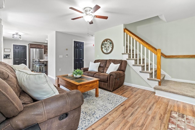 16 Ches Mae Ln, Milford, NH 03055 - living room featuring a ceiling fan, baseboards, stairs, and light wood-type flooring